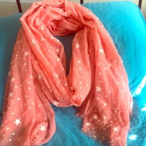 Long salmon/coral colored scarf with stars